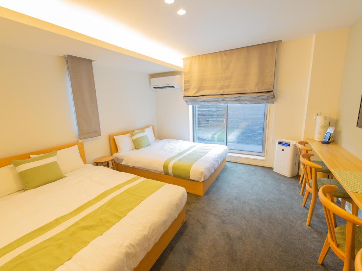 Aparthotel Grand Base Hiroshima Ekimae Esterno foto