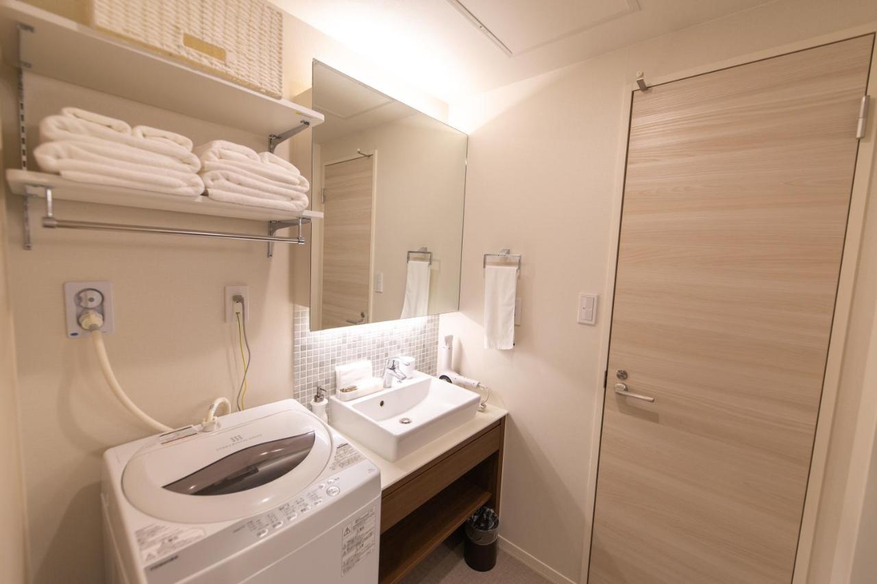 Aparthotel Grand Base Hiroshima Ekimae Esterno foto