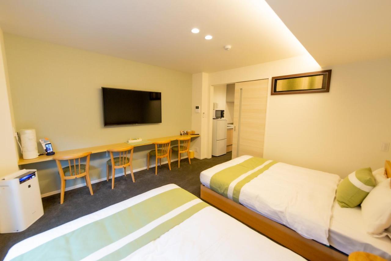 Aparthotel Grand Base Hiroshima Ekimae Esterno foto
